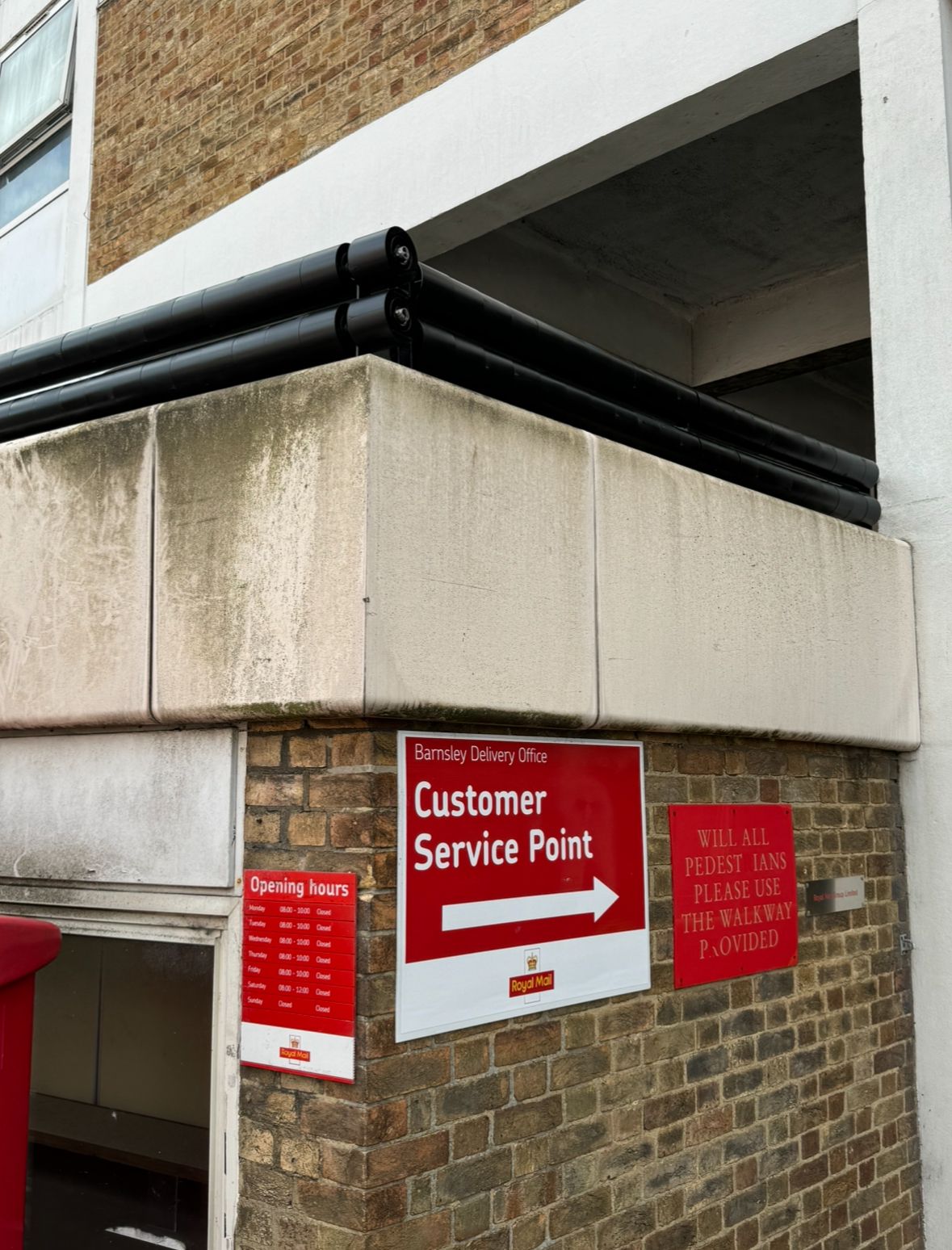 Tubular steel pedestrian barriers at Royal Mail Customer Service Point, Barnsley